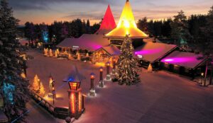 Christmas lights and Arctic Circle in Santa Claus Village in Rovaniemi