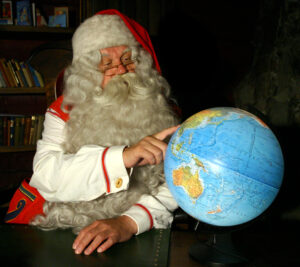 Papá Noel / Santa Claus preparando su gran vuelta alrededor del mundo